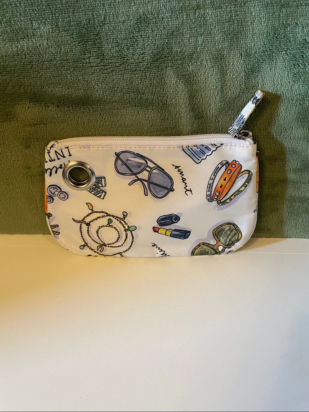 3 Piece Set of Cosmetic Bags; 1-Orange(Non/leather), 2- Multicolored(Cloth)